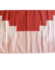 LOOM Imports handwoven ethical flat weave wool rugs. B Corp certified, women owned, fair trade, natural sustainable materials.