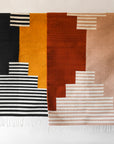 LOOM Imports handwoven ethical flat weave wool rugs. B Corp certified, women owned, fair trade, natural sustainable materials.