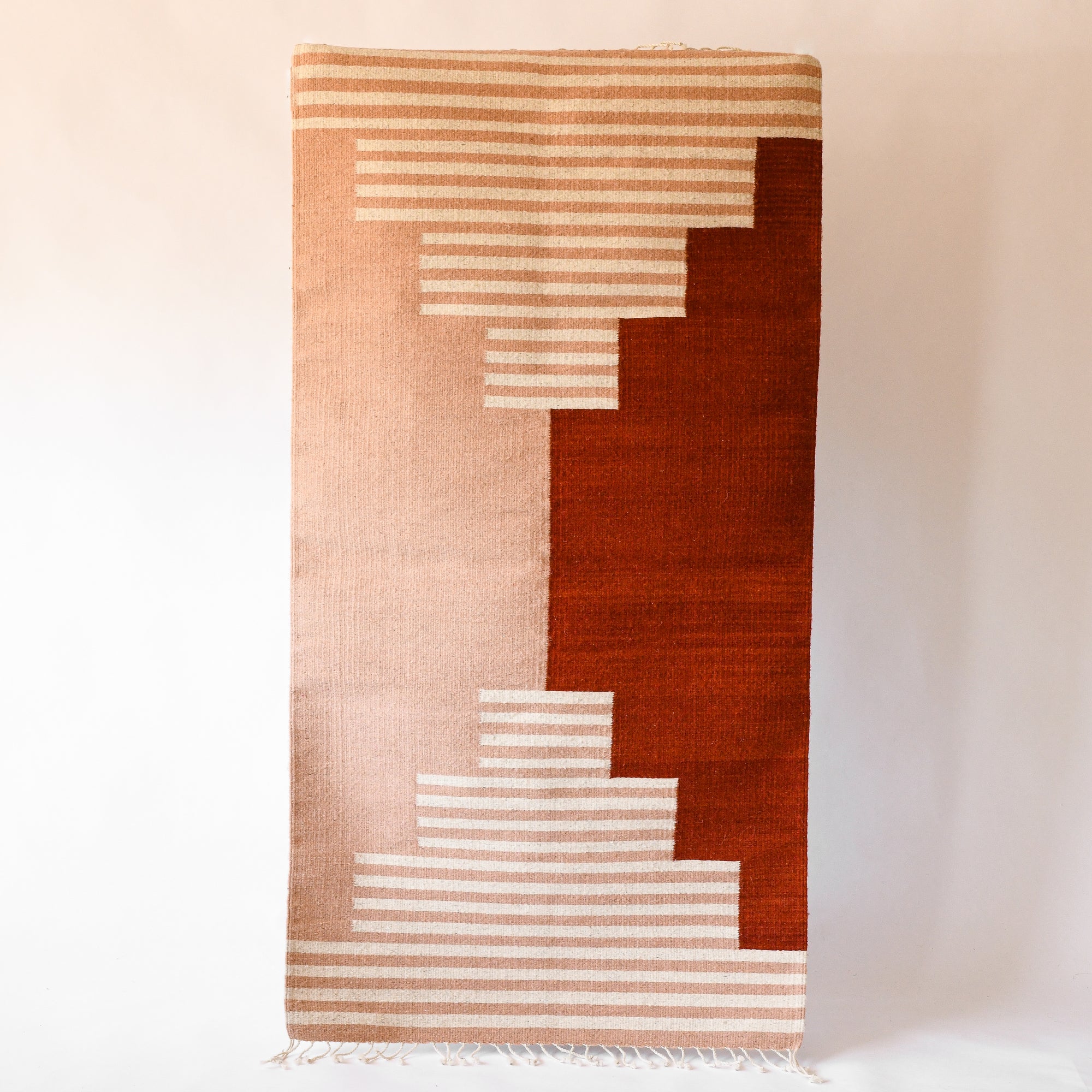 LOOM Imports ethically handwoven sustainable flat weave wool rug