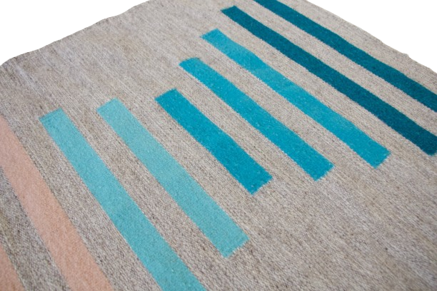 LOOM Imports handwoven ethical flat weave wool rugs. B Corp certified, women owned, fair trade, natural sustainable materials.