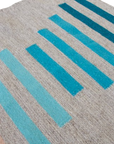 LOOM Imports handwoven ethical flat weave wool rugs. B Corp certified, women owned, fair trade, natural sustainable materials.