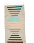 LOOM Imports handwoven ethical flat weave wool rugs. B Corp certified, women owned, fair trade, natural sustainable materials.