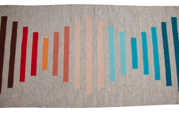 LOOM Imports handwoven ethical flat weave wool rugs. B Corp certified, women owned, fair trade, natural sustainable materials.