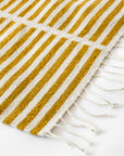 LOOM Imports handwoven ethical flat weave wool rugs. B Corp certified, women owned, fair trade, natural sustainable materials.