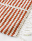 LOOM Imports handwoven ethical flat weave wool rugs. B Corp certified, women owned, fair trade, natural sustainable materials.