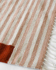 LOOM Imports handwoven ethical flat weave wool rugs. B Corp certified, women owned, fair trade, natural sustainable materials.
