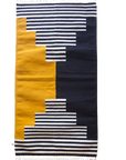 LOOM Imports handwoven ethical flat weave wool rugs. B Corp certified, women owned, fair trade, natural sustainable materials.