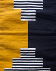 LOOM Imports handwoven ethical flat weave wool rugs. B Corp certified, women owned, fair trade, natural sustainable materials.