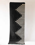 LOOM Imports handwoven ethical flat weave wool rugs. B Corp certified, women owned, fair trade, natural sustainable materials.