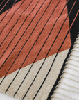 LOOM Imports handwoven ethical flat weave wool rugs. B Corp certified, women owned, fair trade, natural sustainable materials.