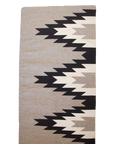 LOOM Imports handwoven ethical flat weave wool rugs. B Corp certified, women owned, fair trade, natural sustainable materials.
