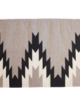 LOOM Imports handwoven ethical flat weave wool rugs. B Corp certified, women owned, fair trade, natural sustainable materials.