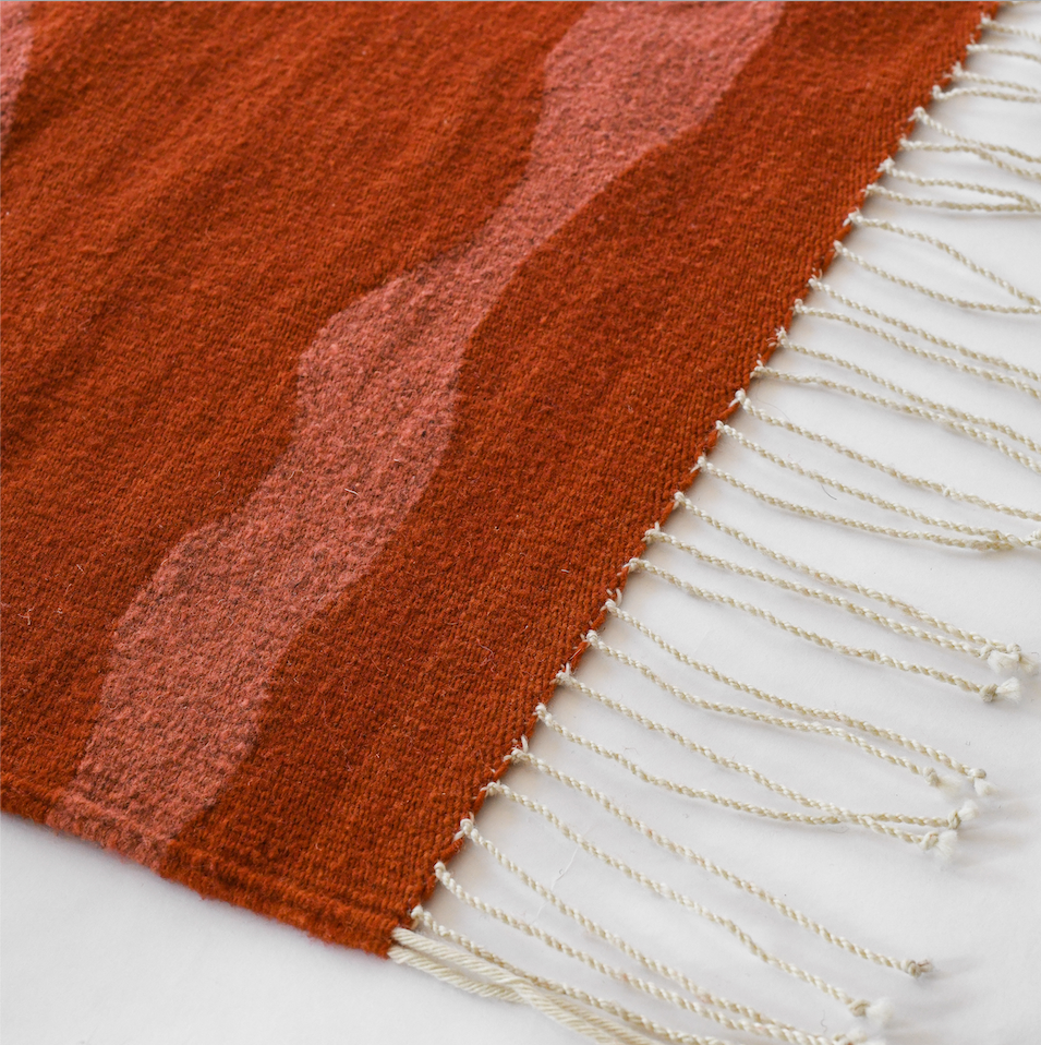 LOOM Imports handwoven ethical flat weave wool rugs. B Corp certified, women owned, fair trade, natural sustainable materials.