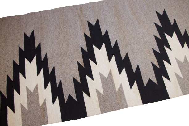 LOOM Imports handwoven ethical flat weave wool rugs. B Corp certified, women owned, fair trade, natural sustainable materials. 